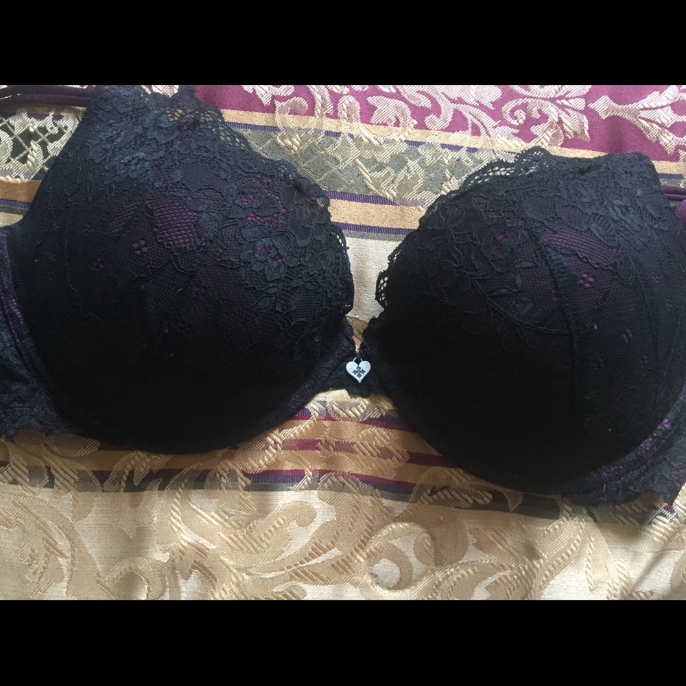 Purple and black lace bra